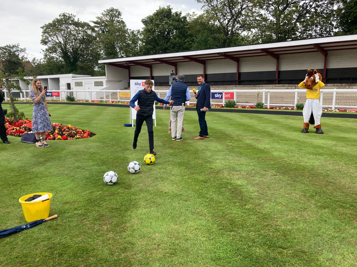 Redcar Racecourse (@redcarracing) on Twitter photo Day three of the <a href="/YorkshireRacing/">Go Racing in Yorkshire</a> Summer Festival and the traditional Paddock & Chips contest has the jockeys chipping balls into targets to raise cash for <a href="/Racingwelfare/">Racing Welfare</a>. Today's winner was <a href="/alex_jary/">Alex Jary</a> with a score of £100. Second was <a href="/FentimanWarren/">Warren Fentiman</a> (pictured) Day three of the <a href="/YorkshireRacing/">Go Racing in Yorkshire</a> Summer Festival and the traditional Paddock & Chips contest has the jockeys chipping balls into targets to raise cash for <a href="/Racingwelfare/">Racing Welfare</a>. Today's winner was <a href="/alex_jary/">Alex Jary</a> with a score of £100. Second was <a href="/FentimanWarren/">Warren Fentiman</a> (pictured)