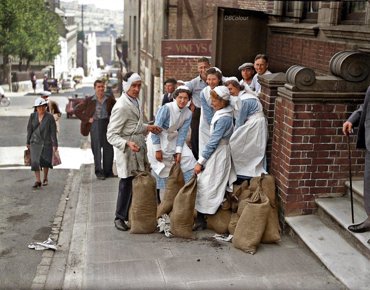 colour_history's tweet image. Nursing staff and patients prepare sand bags to be placed in front of the windows of the 'Sussex Ear Nose and Throat Hospital' in Church Street, Brighton. 1939
(B&W image source - 'The Keep')