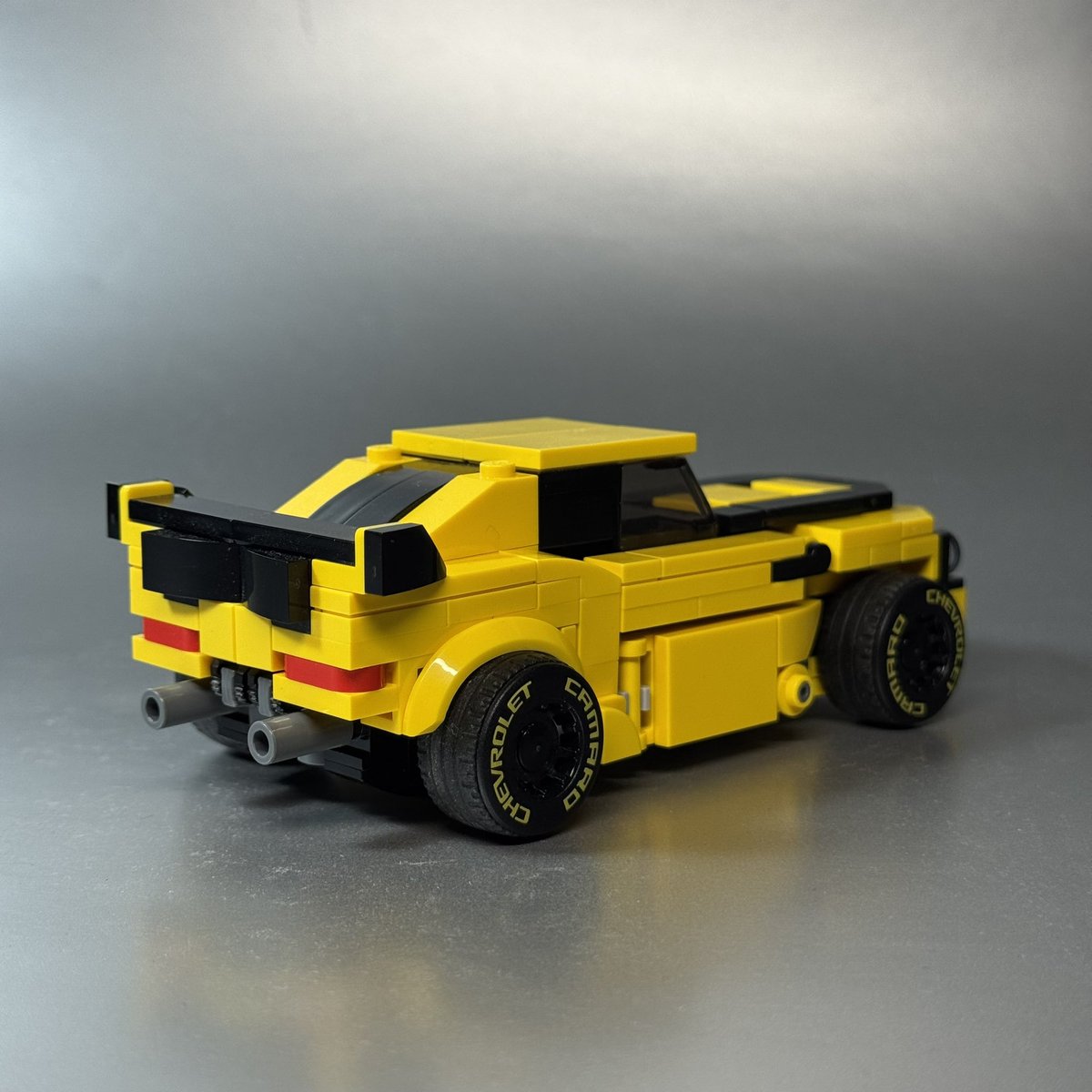 plastic_paddock's tweet image. Bumblebee heavily inspired by @studentscissors barricade build. My main goal was to keep its solid build and and have a more 6 wide speed champions aesthetic.