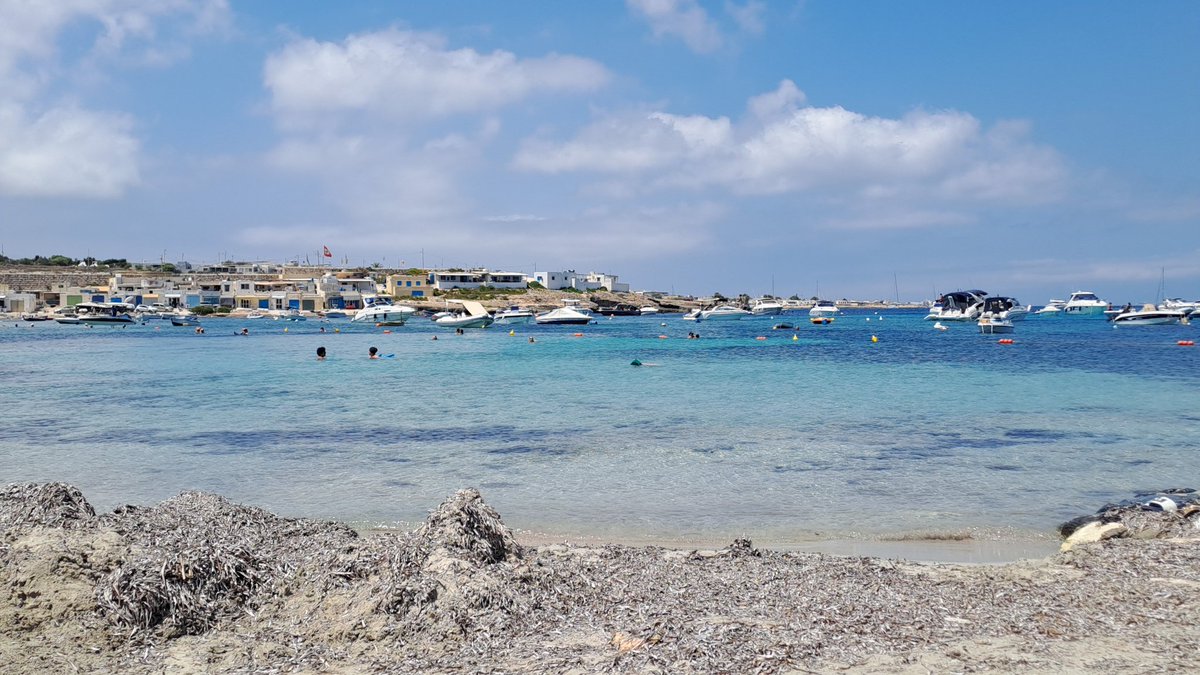 Small island, small sandy beach ⛱️ 🇲🇹  Malta