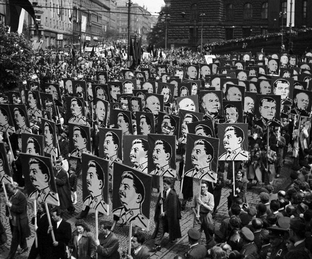 Celebration of the 5th anniversary of the liberation of Prague by the Red Army. Demonstrators carry posters with portraits of I.V. Stalin and Soviet marshals. Czechoslovakia, Prague, 1950.