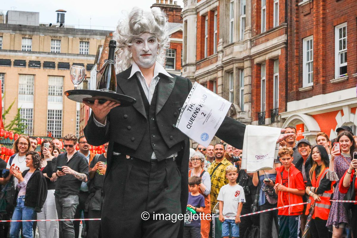 imageplotter's tweet image. Funny weather today, rain and sunshine at the same time. But here are some shots from the always fun annual #Soho #WaitersRace, including one with Soho legend @SohoGeorge and the very friendly @LM_Westminster . Pics @Alamy_Editorial & @avalondotred