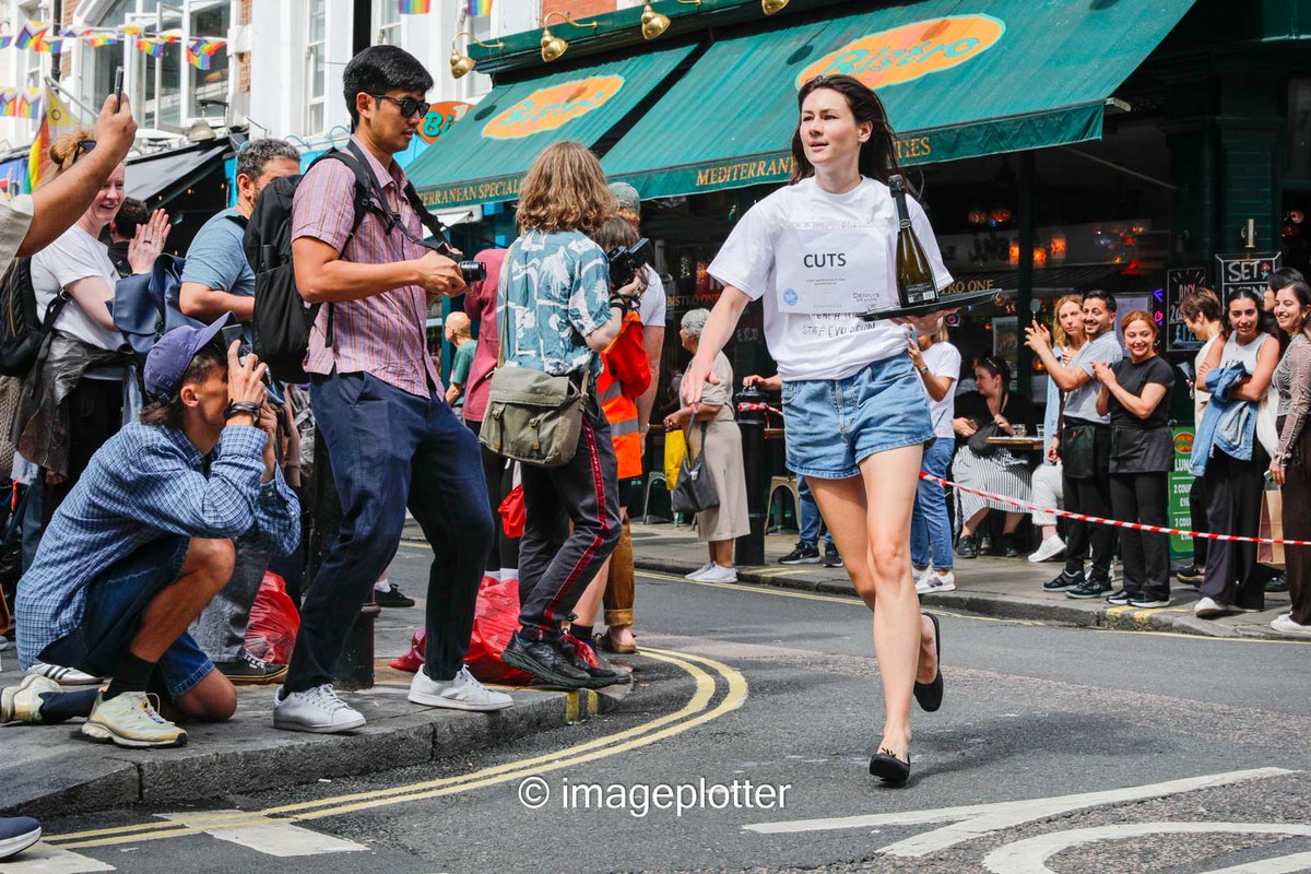imageplotter's tweet image. Funny weather today, rain and sunshine at the same time. But here are some shots from the always fun annual #Soho #WaitersRace, including one with Soho legend @SohoGeorge and the very friendly @LM_Westminster . Pics @Alamy_Editorial & @avalondotred
