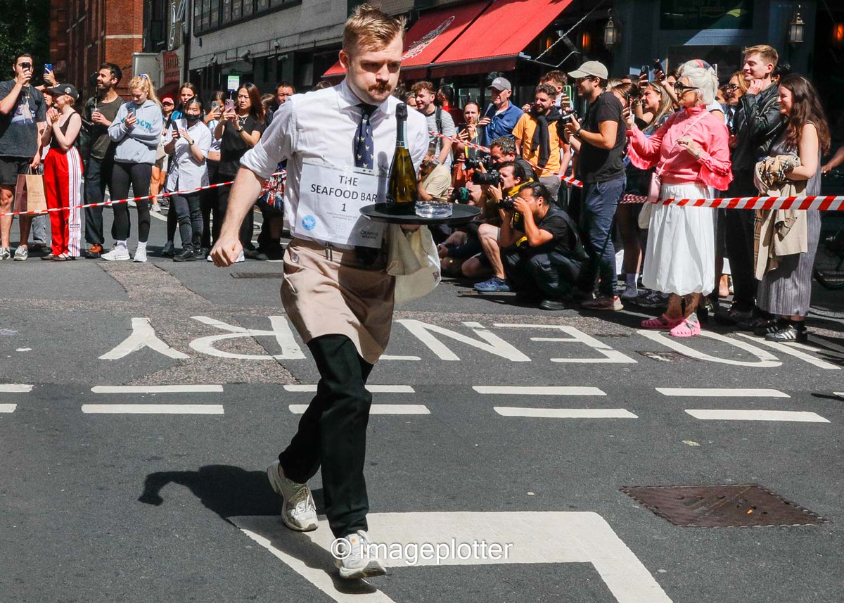 imageplotter's tweet image. Funny weather today, rain and sunshine at the same time. But here are some shots from the always fun annual #Soho #WaitersRace, including one with Soho legend @SohoGeorge and the very friendly @LM_Westminster . Pics @Alamy_Editorial & @avalondotred