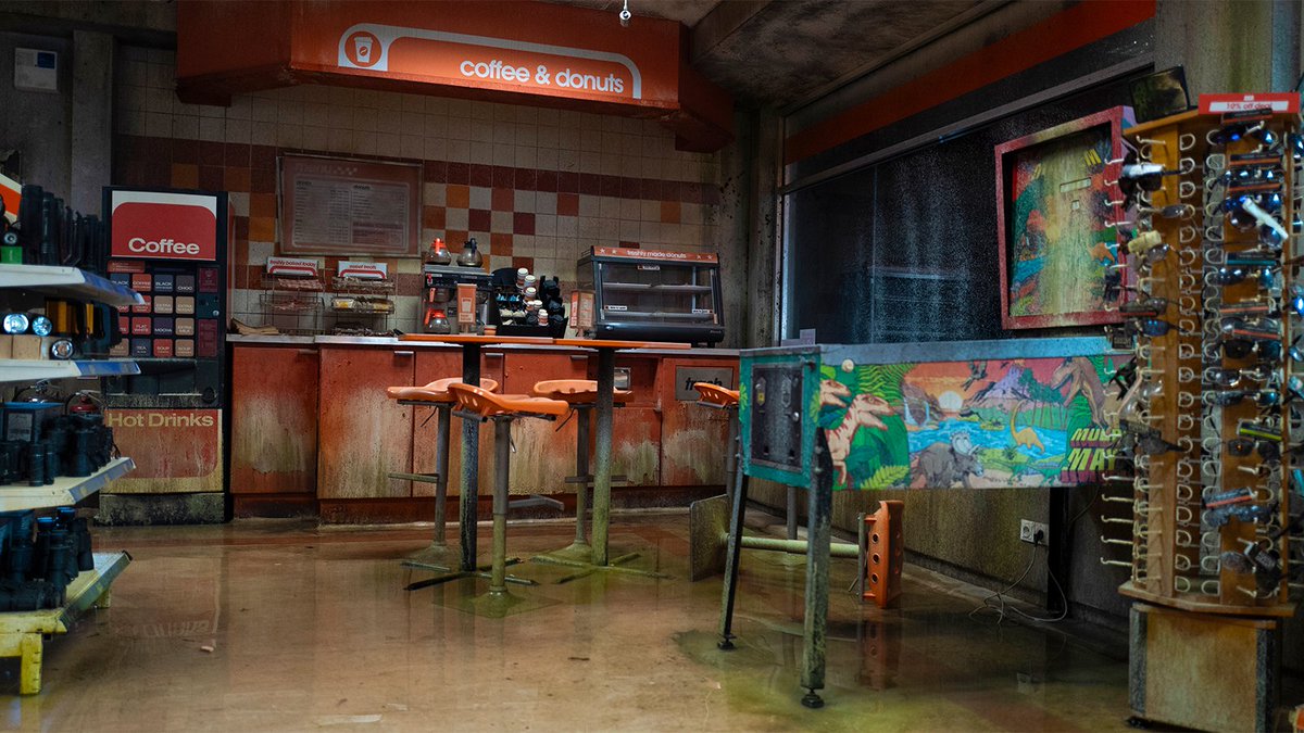 Part_Time_Hero's tweet image. And some more looks at all the detail that went into #JurassicWorldRebirth 's Qualtech convenience store. Really enjoyed seeing the contrast of this normality in the midst of an InGen facility. (Via sophiecowdrey.com/jurassic-world…)