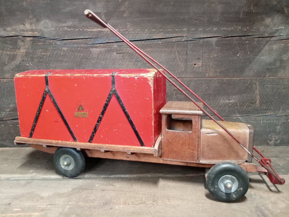 A nice early Triang wooden pull a long truck still with it's original back dating from 1920's-1930's.
#Triang #LinesBros
#HistoryBehideTheToys
#WhatsInYourAttic