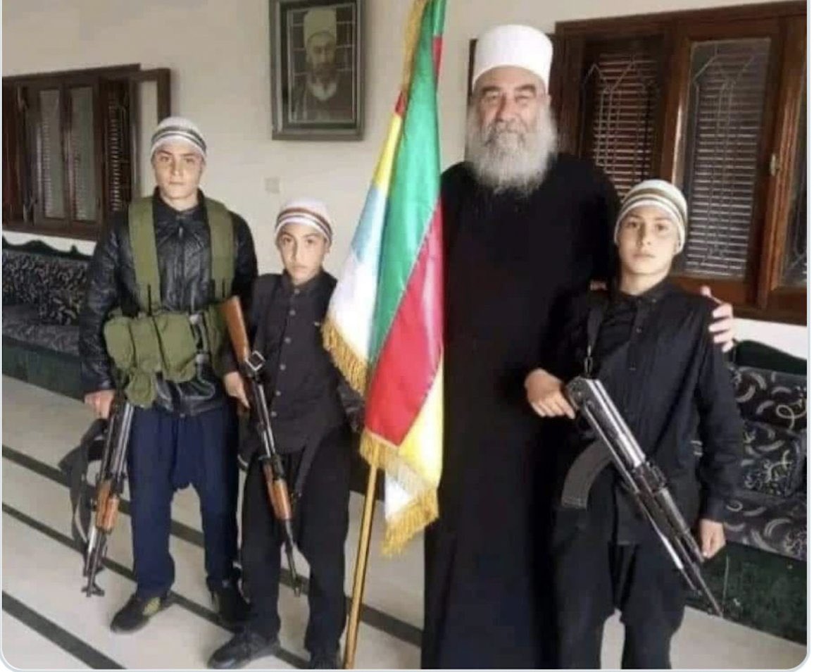 AimenDean's tweet image. A 12-year-old Druze sniper caught by Bedouin fighters. Granted amnesty, he cried, “It’s not my fault, my elders made me do it.” Begged not to be filmed. Too late. This is where al-Hijri’s leadership has taken us: child soldiers.