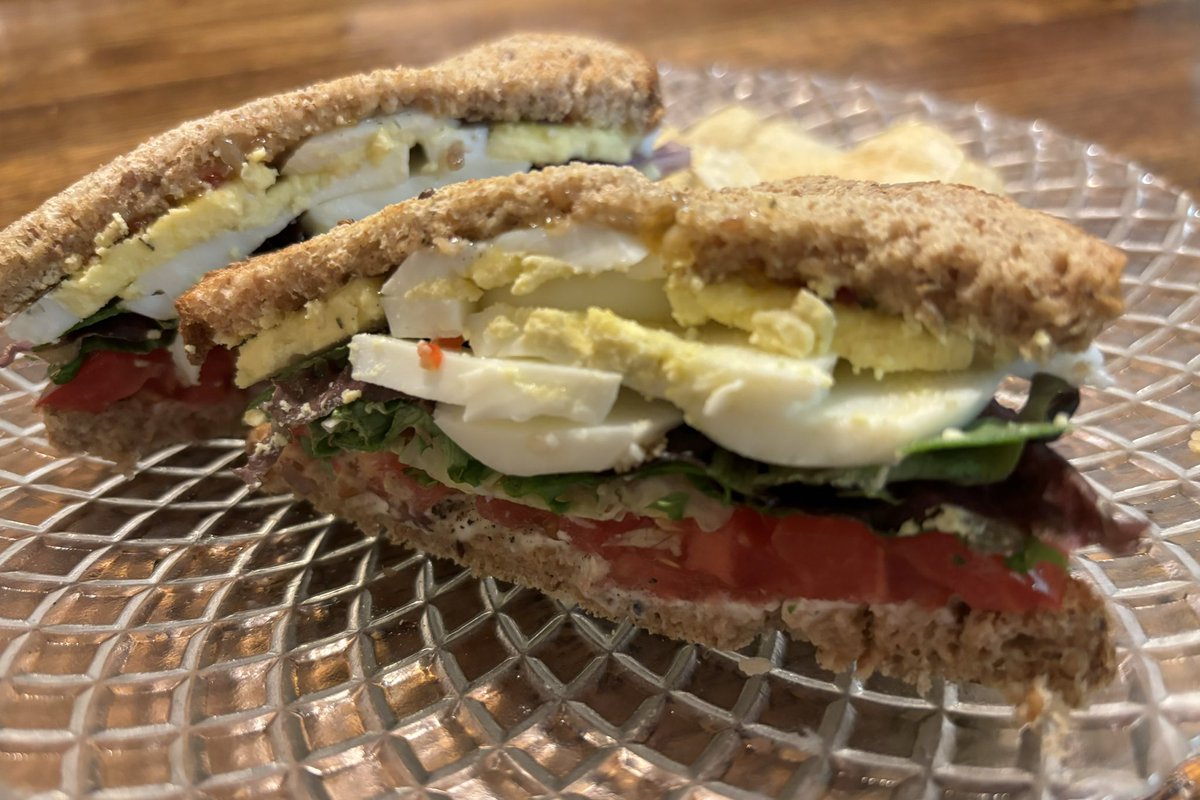 Egg sandwich 🥪 with a garden tomato, variety of lettuces, pepper, mayo, jalapeño jam and dill weed. 👍😋👍 #sandwich