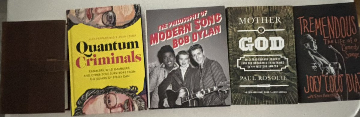 MrRedude's tweet image. New books haul

(Far left is an Arthur Morgan journal replica)