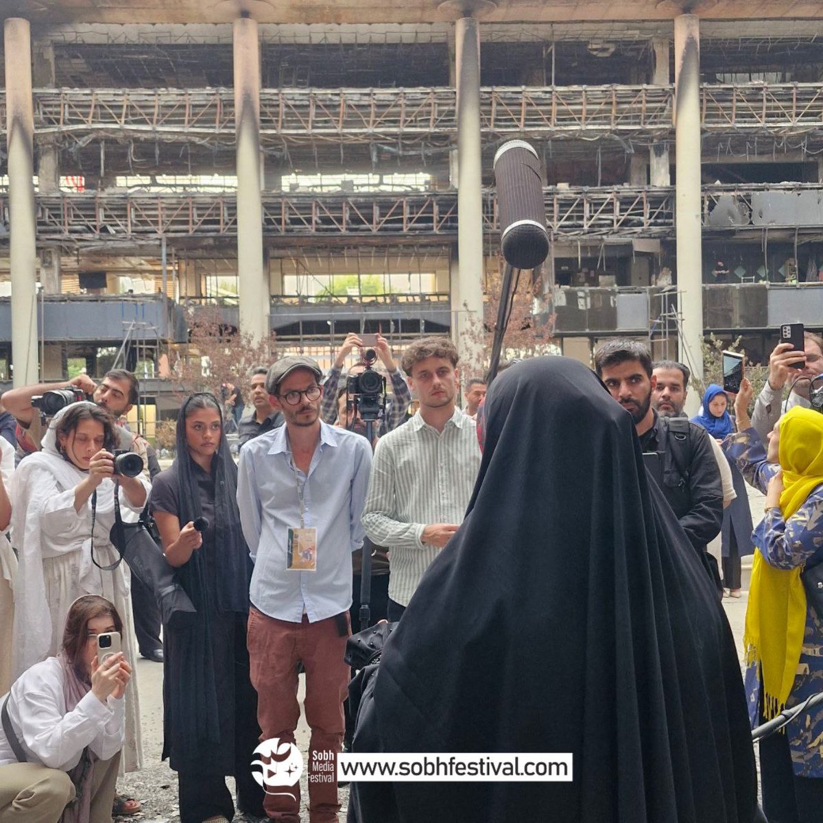 Sobh_festival's tweet image. Int'l. Journalist Visit IRIB Headquarters Hit by Israeli Strikes
Media activists invited to Iran were brought to IRIB to see national headquarters shattered due to the Israeli regime's attack.
بازدید فعالان رسانهای بین المللی از ساختمان شیشهای صدا و سیما
فعالان رسانهای…