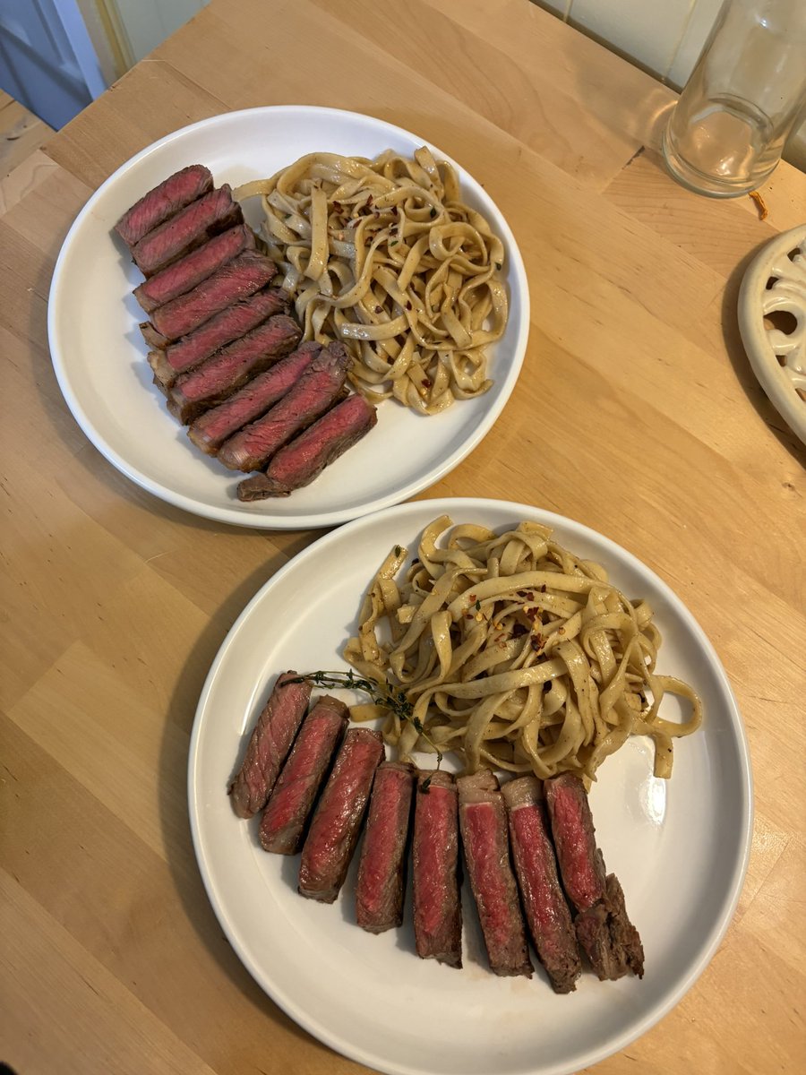 chojihuu's tweet photo. us and the dinner we made (steak and pasta) https://t.co/8bKjM7xZEm
