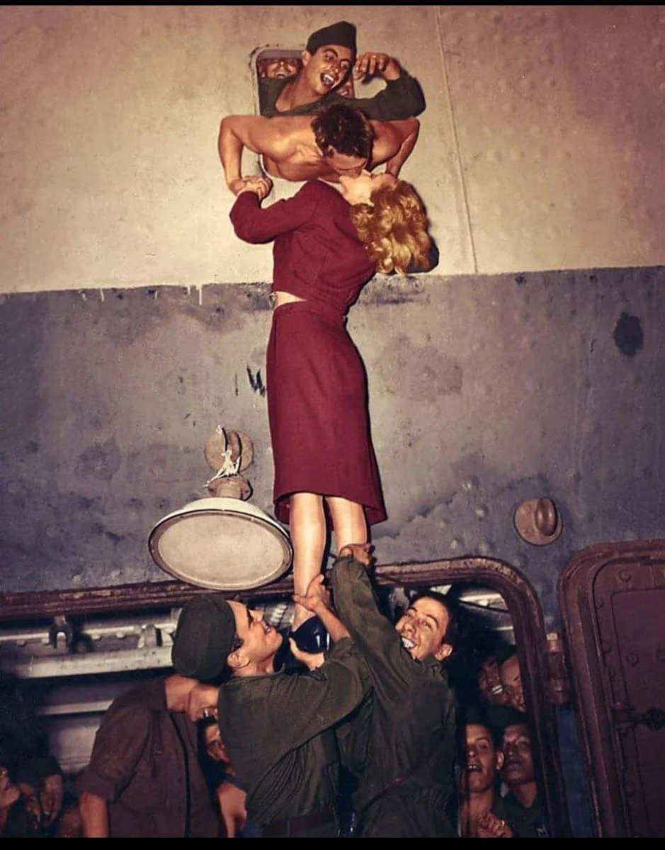 timecaptales's tweet image. Hollywood star Marlene Dietrich kissing American soldier Carus Olcott, who was returning to New York during World War ll, 1945.