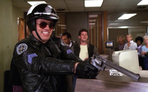 JohnnyLCKai's tweet image. This is the daily salute to a badass and today it goes out to the original gun nut who doesn’t believe in overkill.
That man is Officer Tackleberry.
Whether it’s a shark swimming too close to the beach or someone trying to steal change from a vending machine,Justice would be…
