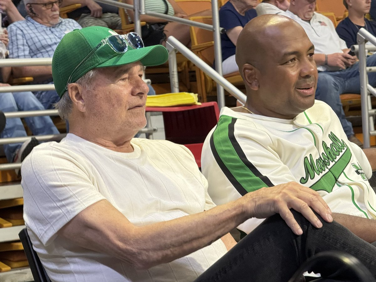 gcarey938's tweet image. Marshall men’s basketball coach Cornelius Jackson taking in the game with former Herd coach Dan D’Antoni.