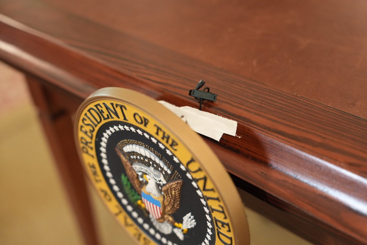 PenguinSix's tweet image. When @potus signs a bill, a small microphone behind the Presidential seal is there to capture the moment.