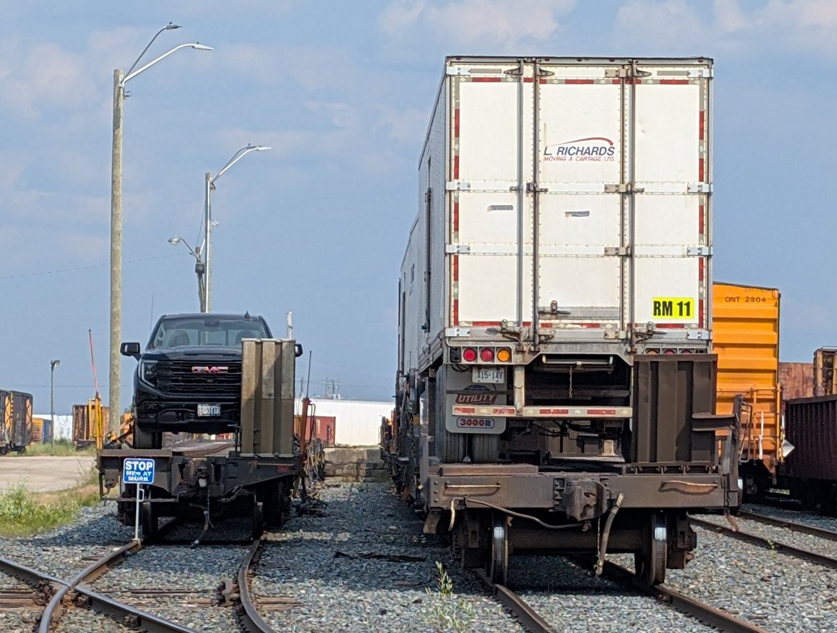 onrgallery's tweet image. A true staple of Northeastern Ontario railroading, piggybacks and chain cars are seen at Cochrane Yard July 19, 2025. #rla_theyards #railsupremacy #trb_express #ontarionorthland