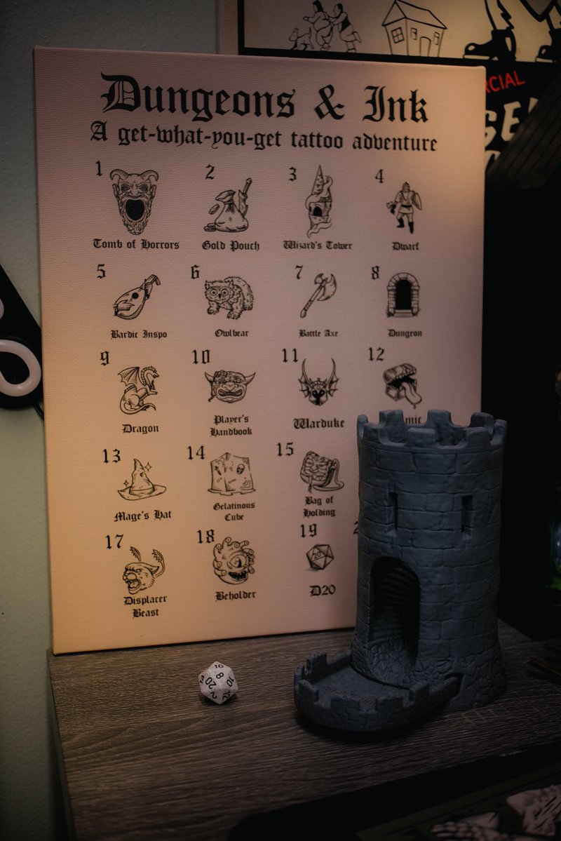 blakeaustinink's tweet image. Dungeons & Ink will be available at Asbury Tattoo Fest all next weekend! Come roll the dice and get tattooed!
HOW IT WORKS
1. Come and roll the D20 twice
2. Match the numbers you rolled to the correlating designs
3. Pick which design you prefer of the two
4. Get it tattooed!…