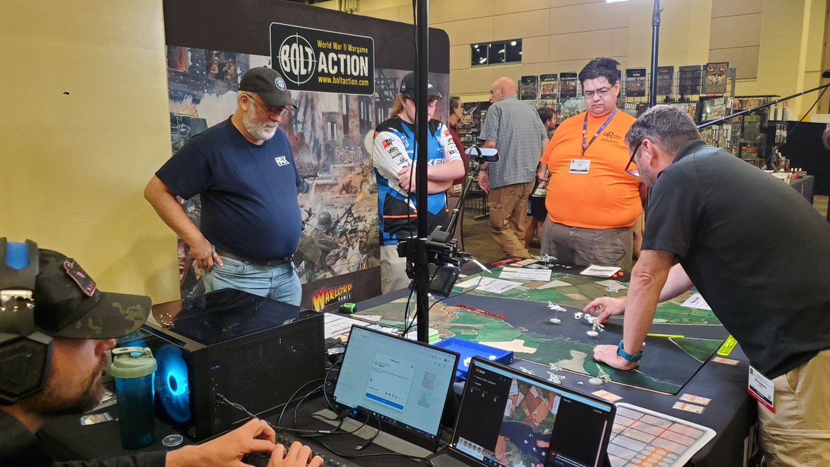 HMGS_Inc's tweet image. Doug Glover & the crew of Lead Pursuit were streaming games of Blood Red Skies-Beyond MiG Alley all weekend at #Historicon2025. Their presence added a great energy to the Exhibit Hall & we are grateful they joined us. Check out their YouTube to understand Doug's expression below!