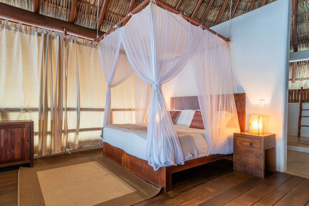 The most beautiful walls are the ones you can see through. Wake up to the sound of waves in your open-air suite. 🌅
#OceanViewSuite #RomanticEscape #TronconesVibes