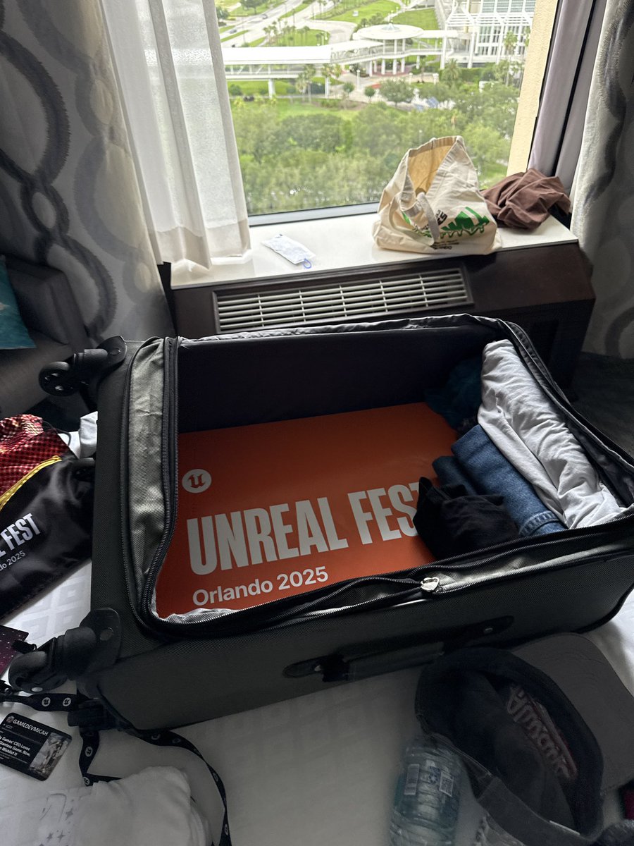 I stole a bathroom sign at UnrealFest