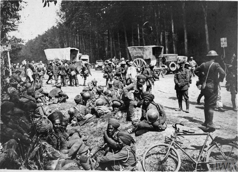 WW1IEPER1917's tweet image. Indian troops resting on the road from Villers-Cotterets to Soissons on the way to relieve French and American units, 21 July 1918. IWM (Q 78897)