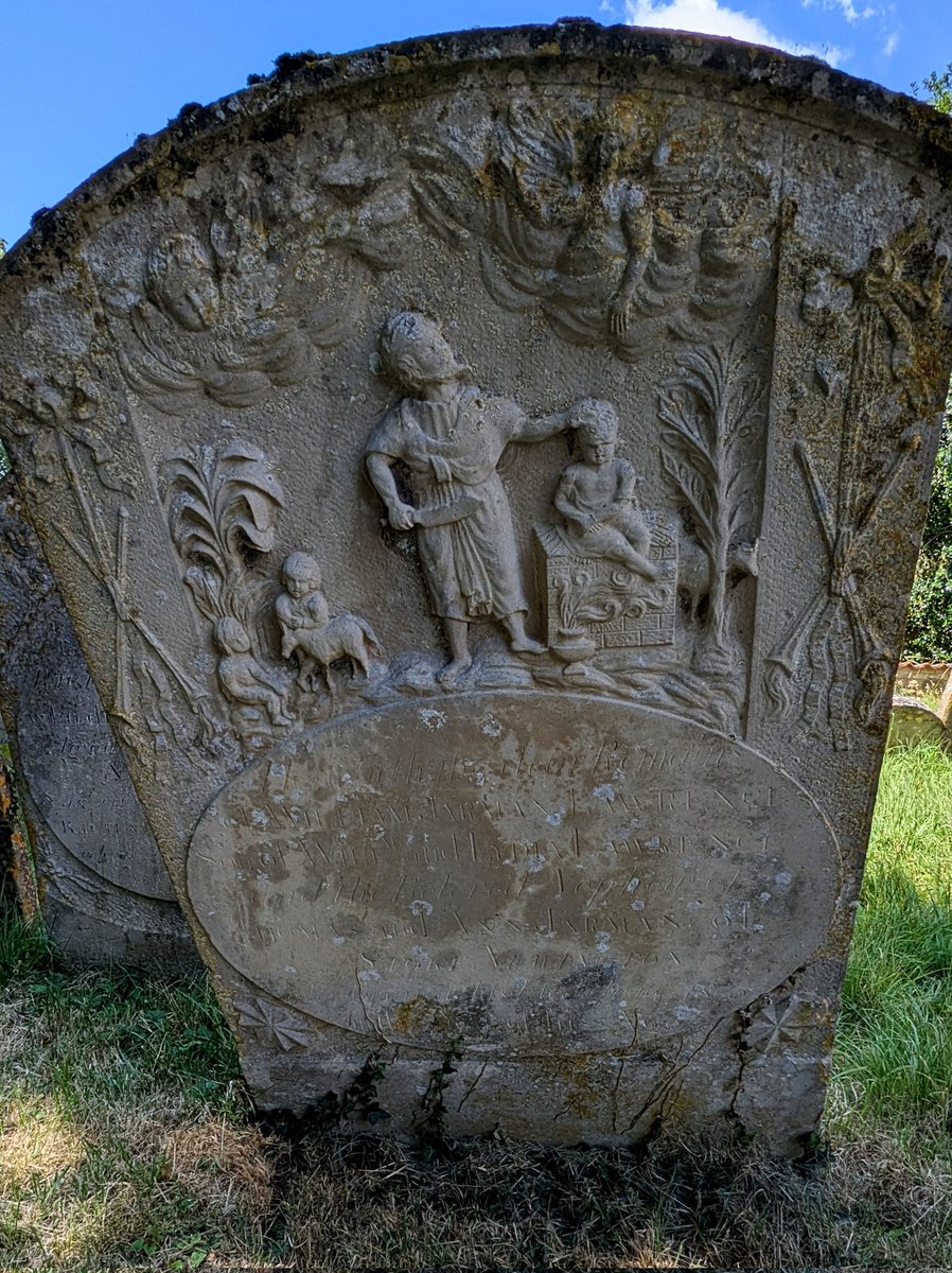 St Peter and St Paul, Great Casterton has a fabulous collection of 18thC gravestones, nearly all carved from local stone.
This one shows the sacrifice of Abraham with the ram hiding behind a very unconvincing tree and two bonus children and a donkey!
#MonumentsMonday