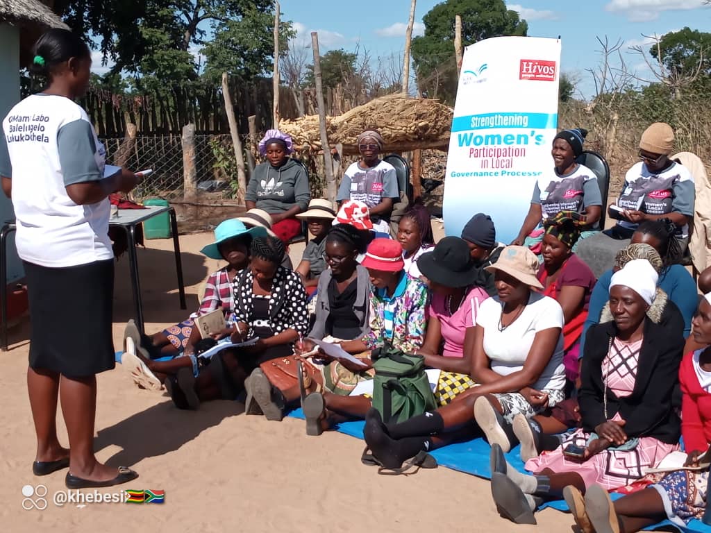 Cllr  Thulisani Nkomo of ward 26, Lupane responding to issues, concerns, challenges raised by women regarding their  participation in local governance issues at a ward outreach meeting meant to conscientize women to effectively participate in local governance processes