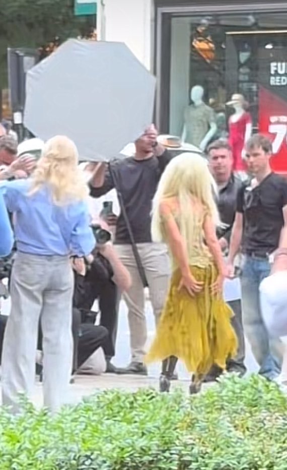 BICONlC's tweet image. Xtina wearing her iconic 2003 Versace campaign dress in London for a photoshoot