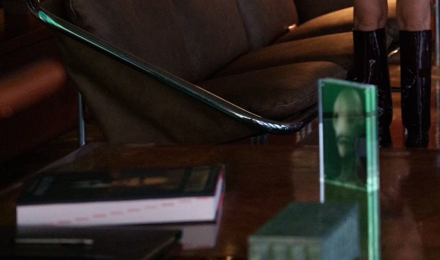 Lex Luthor has a portrait of Mister Handsome on his desk