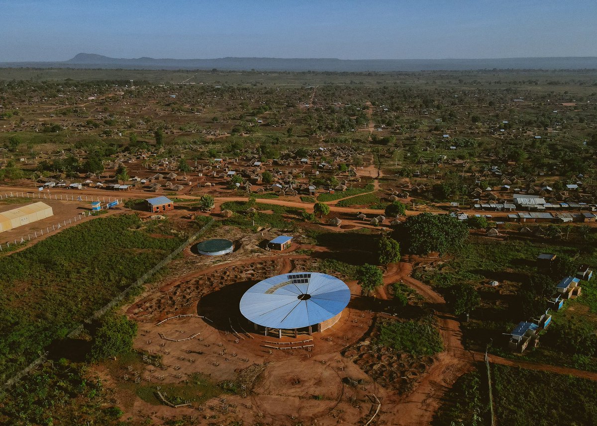 w_emerg's tweet photo. Can earth bricks & music rebuild hope in refugee communities? In Uganda's Bidi Bidi, a stunning amphitheatre by Hassell, Localworks & https://t.co/4Kgq4u2kkr unites 250K+ refugees through culture, sustainability & resilience.
#EarthBricks #Refugee #Music #Uganda #Design #Healing https://t.co/DjK6YrUJK8