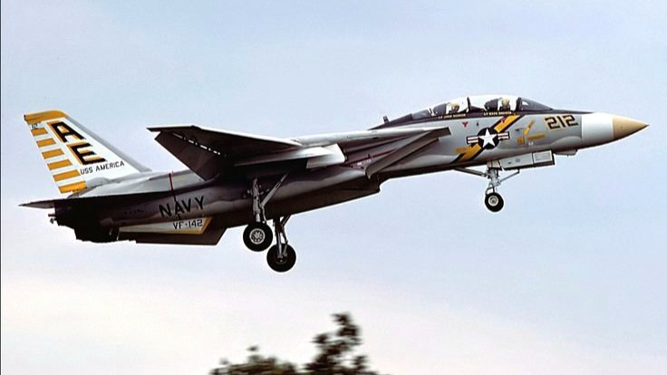 RealAirPower1's tweet image. An F-14A from VF-142 "Ghostriders" arriving at RAF Greenham Common for IAT 76. VF-142 transitioned to the Tomcat in 1975 and flew it until the squadron stood down in 1995.