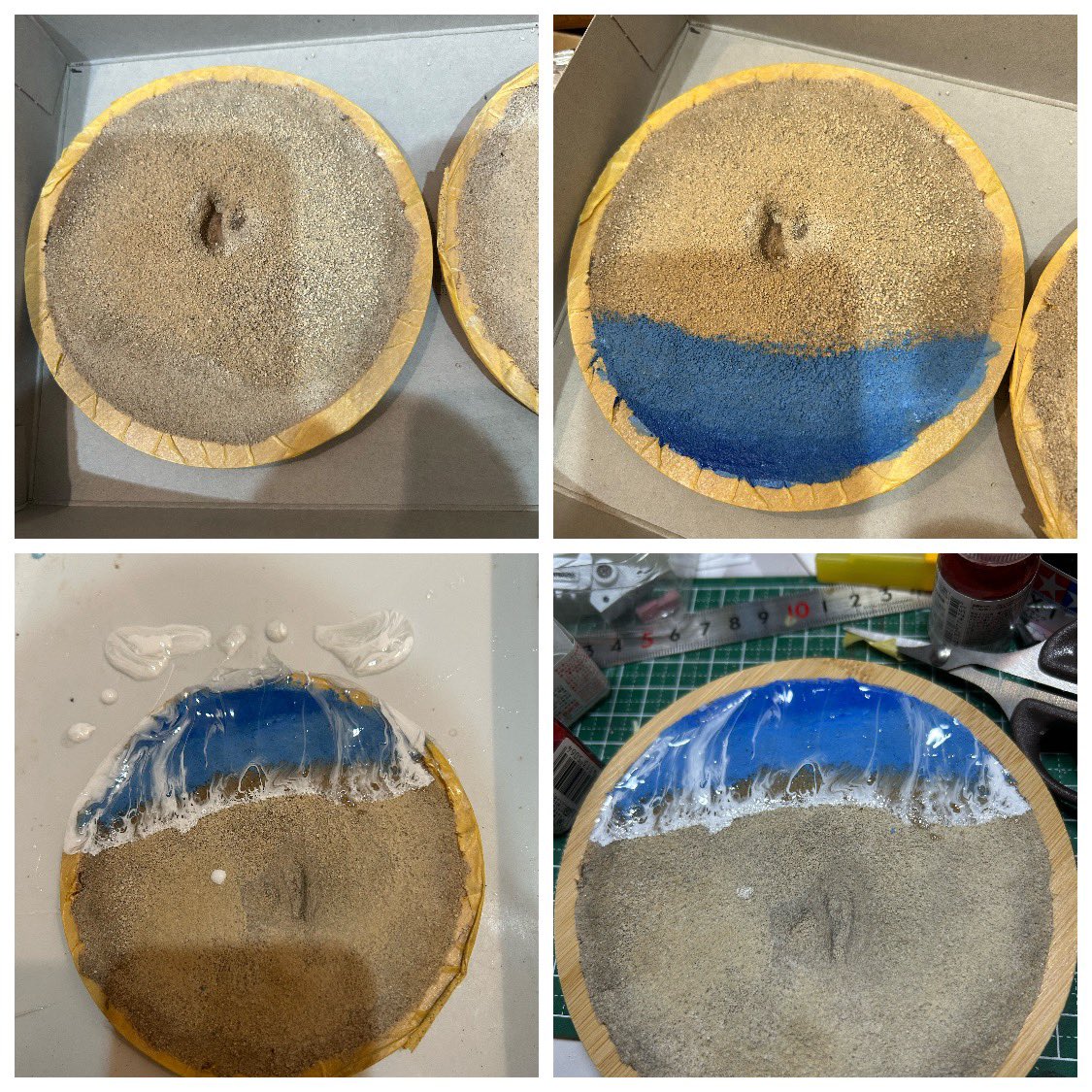 dada_aion01's tweet image. 台座作りも始めました。
100均のバンブートレーに紙粘土砂浜の土台を作ってから砂をコーティング。
アクリルガッシュで青色を塗って、エポキシレジンで波表現。
相変わらず難しく失敗しました。
もう一つ保険で台座用意してたので、後日リトライします。(*´꒳`*)