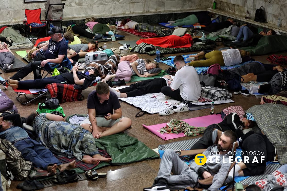 StratcomCentre's tweet image. Kyiv residents sheltering in metro stations during last night's massive missile and drone attack on the city.