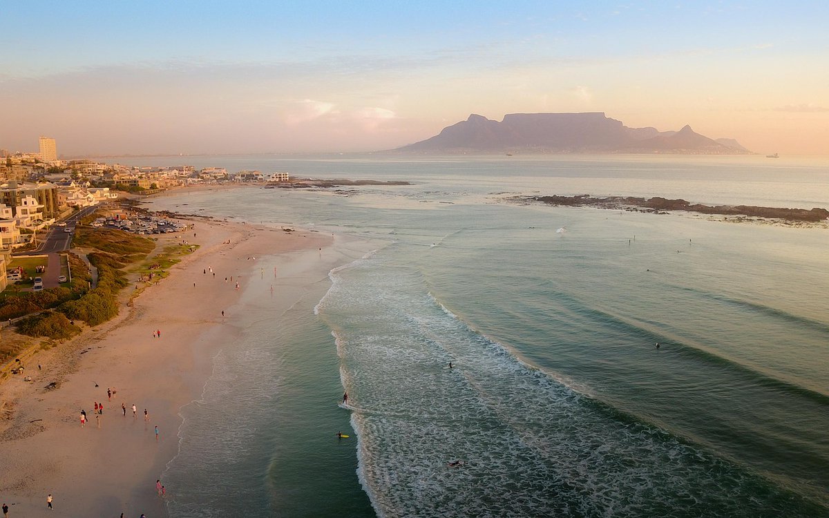 This week's spotlight travel destination is the spectacular city of Cape Town, South Africa.  Nestled between the majestic Table Mountain and the sparkling Atlantic Ocean, this coastal gem offers a plethora of activities for every type of traveler.  Nature enthusiasts can explore