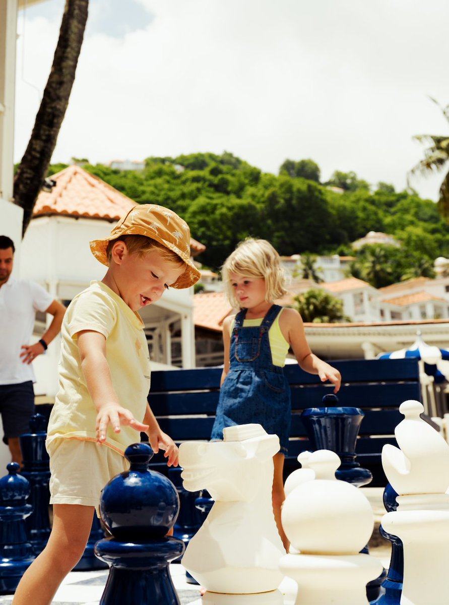 Beach days at Windjammer Landing are more than just sand and sea, there’s fun for all ages. Family-friendly games like giant chess right on the beach keep the whole family engaged. It's the perfect mix of play and relaxation.  #MyWJL