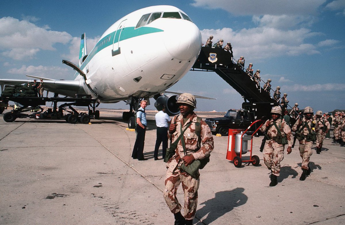 Reforger85's tweet image. members of the 82nd airborne leave their chartered Transaamerica DC-10 upon their arrival for Exercise Bright Star '82