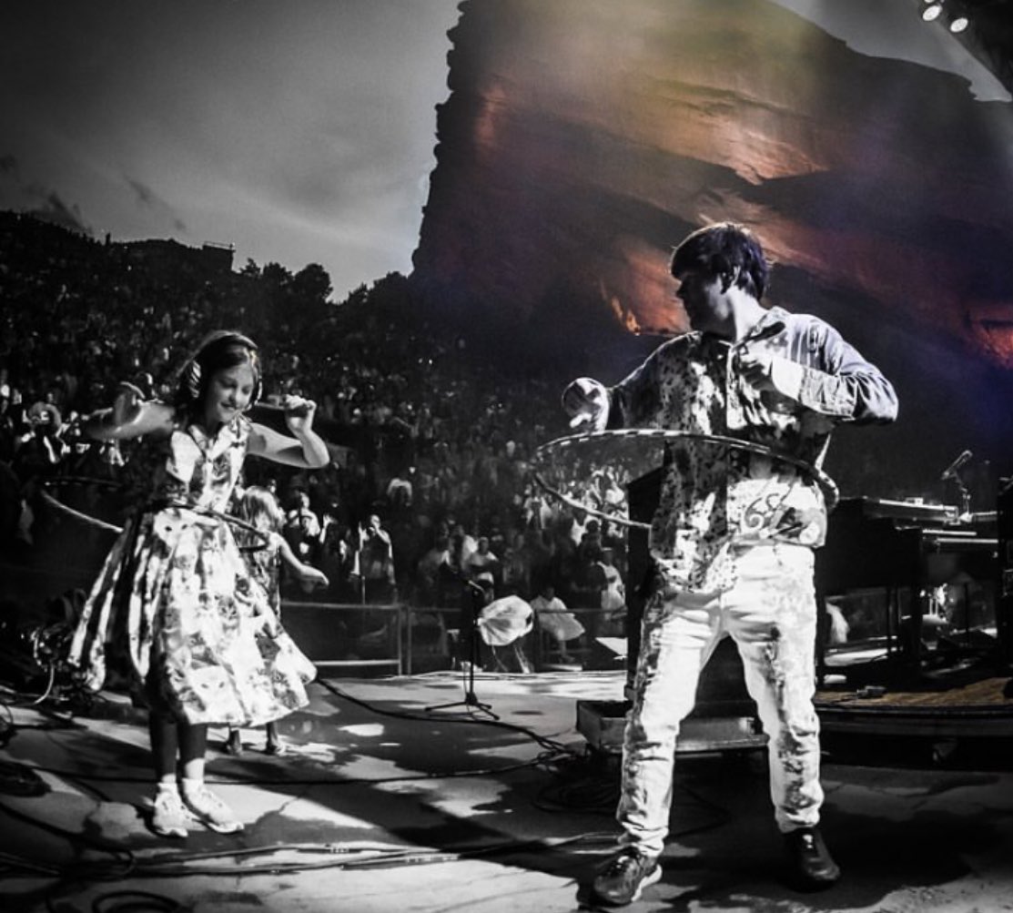 KyleOnKeys's tweet image. What a great couple nights at Red Rocks! I found this old photo of Zoe and me hula hooping on stage. What amazes me about playing this venue for so many years is seeing multiple generations growing & coming together to celebrate music & family. Show us your Cheese fam pics below!