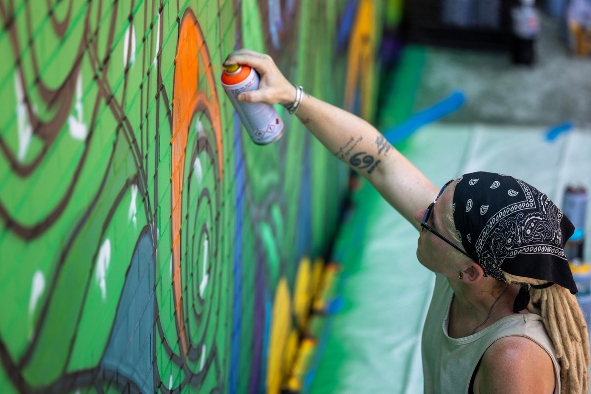 JerseyCity's tweet image. The Jersey City Mural Arts Program partnered with a group of Saint Peter's staff members and students to create a mural that really spoke to Saint Peter's and their Peacock mascot. The design of "Saint Peter's" was done by mural artist Jenna Morello @jennamorello