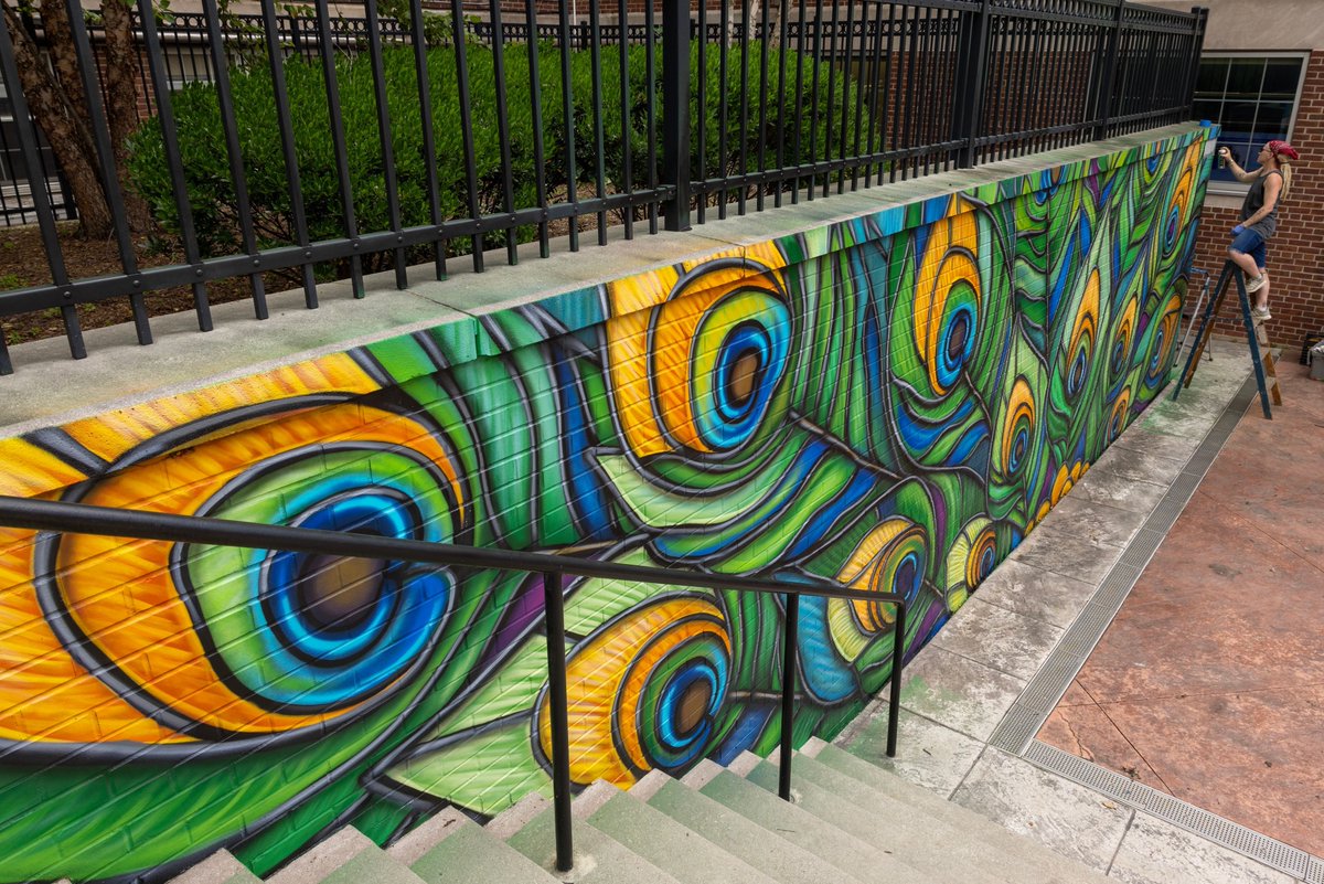 JerseyCity's tweet image. The Jersey City Mural Arts Program partnered with a group of Saint Peter's staff members and students to create a mural that really spoke to Saint Peter's and their Peacock mascot. The design of "Saint Peter's" was done by mural artist Jenna Morello @jennamorello