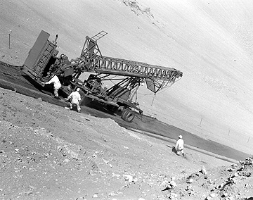 AtomicMuseum's tweet image. What does it take to study a nuclear crater? A nine-ton drill rig and a mission to go 320 feet underground. Used at Sedan Crater in 1963, this equipment supported vital research at the Nevada Test Site as part of efforts to understand—and harness—nuclear power for engineering.