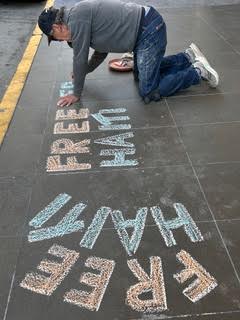Revolutionary Love Brigade lays down #solidarity with #Haiti in front of the French Embassy in San Francisco during Week of Solidarity with Haiti!