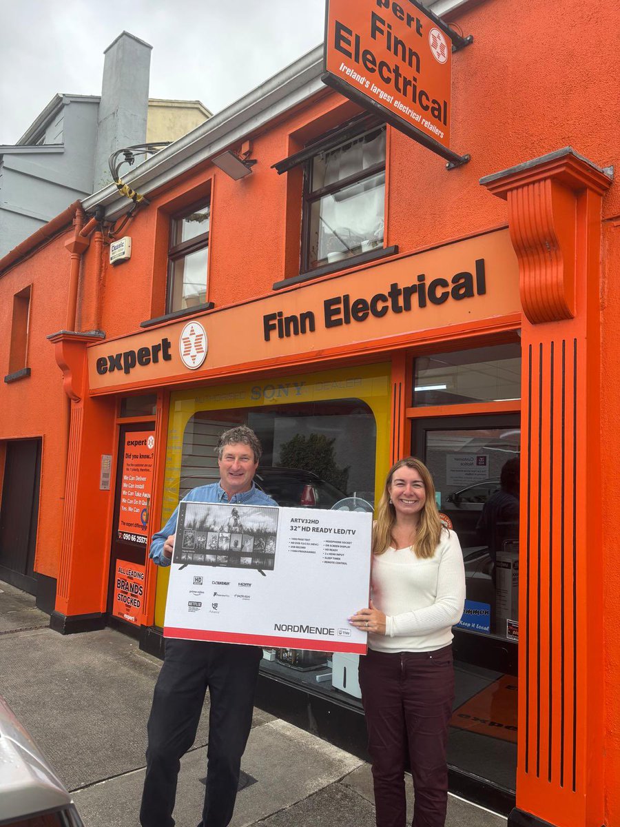 🎉 Lucky Winner! 🎉
Rachel Kelly picking up the TV she won at our U12 Festival of Football raffle! Pictured with Rachel is Tommy Beades from Finn Electrical.

A massive thank you to Finn Electrical for generously sponsoring the prize and a gentle reminder to always shop local and