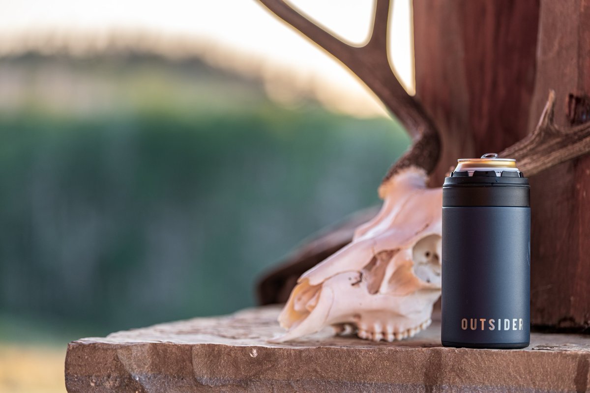 outsider's tweet image. The Outsider PM doesn’t play around. Fits almost any can or bottle. Keeps it ice cold. Built-in bottle opener. This is your drink’s new best friend.
🛒 outsider.com
