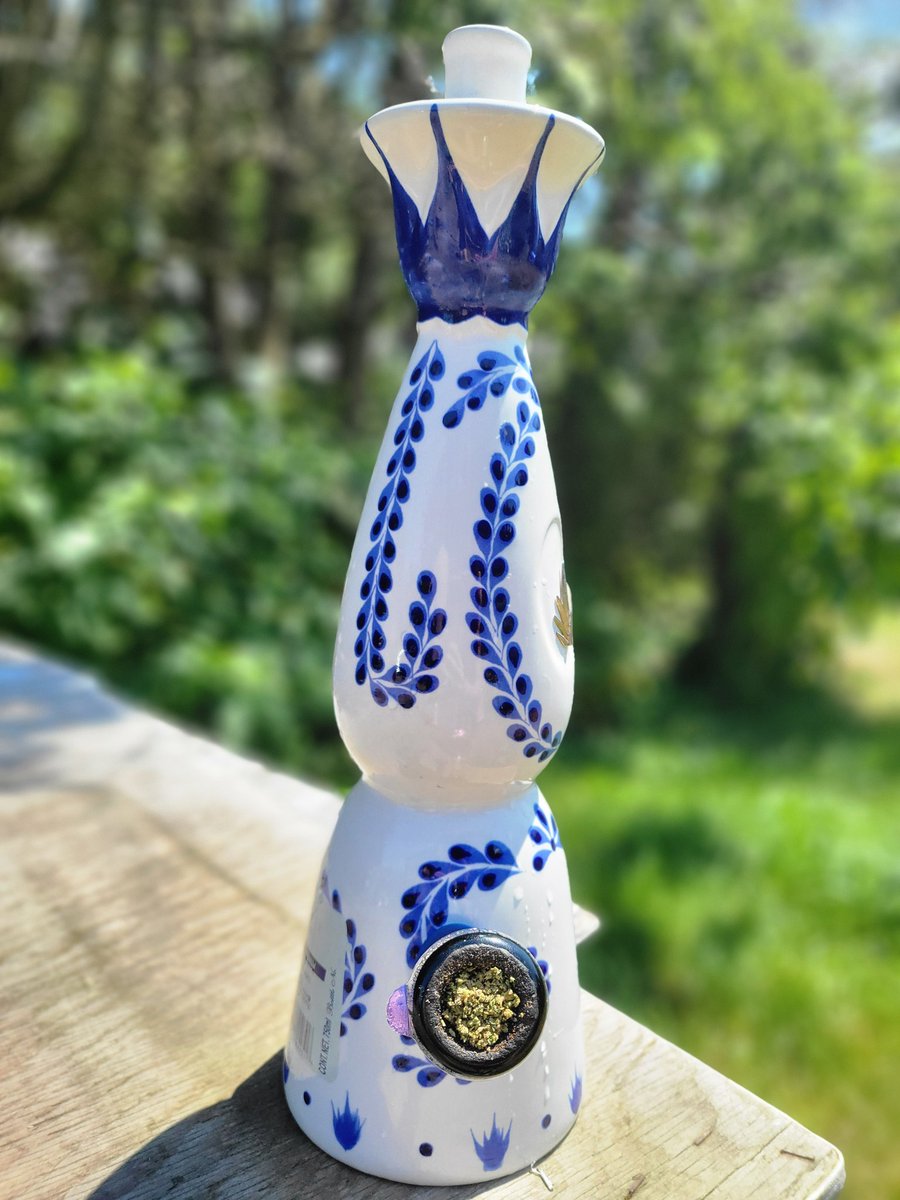 THCyal8tr's tweet image. smoking weed out of a tequila bong