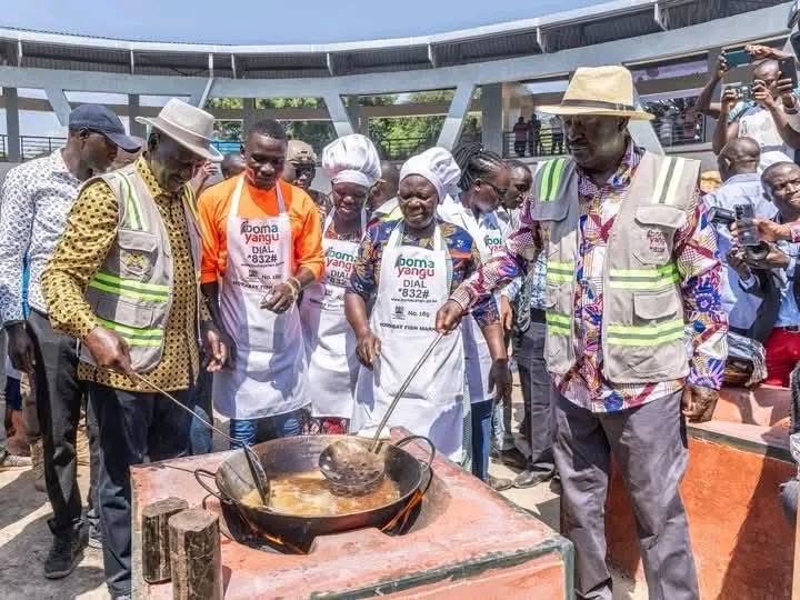 Wantam teaching Raila Odinga on how to cook lies.