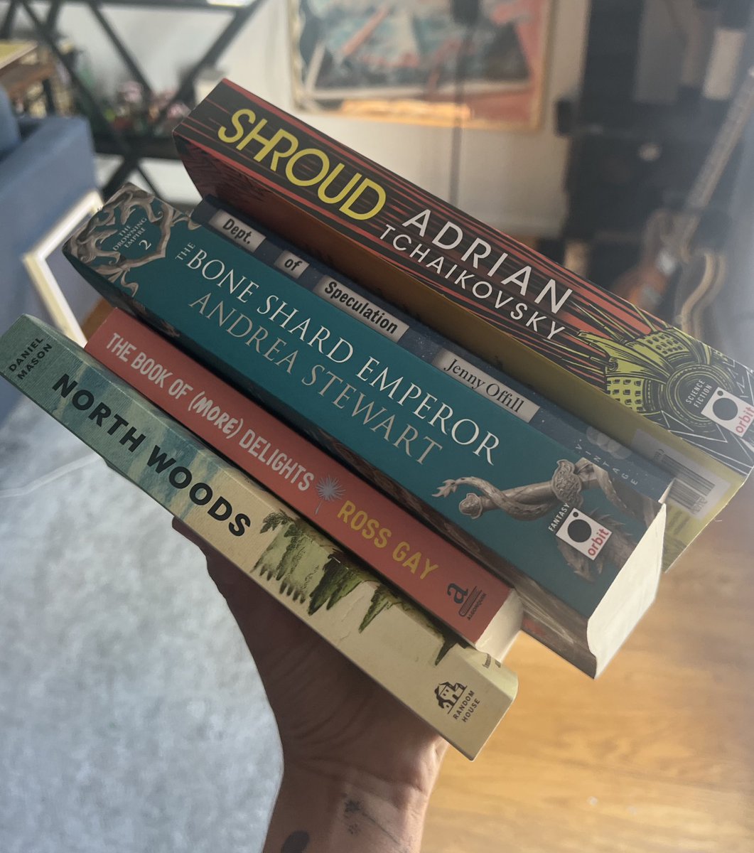 baileyzindel's tweet image. girl who spent too much money at the bookstore again