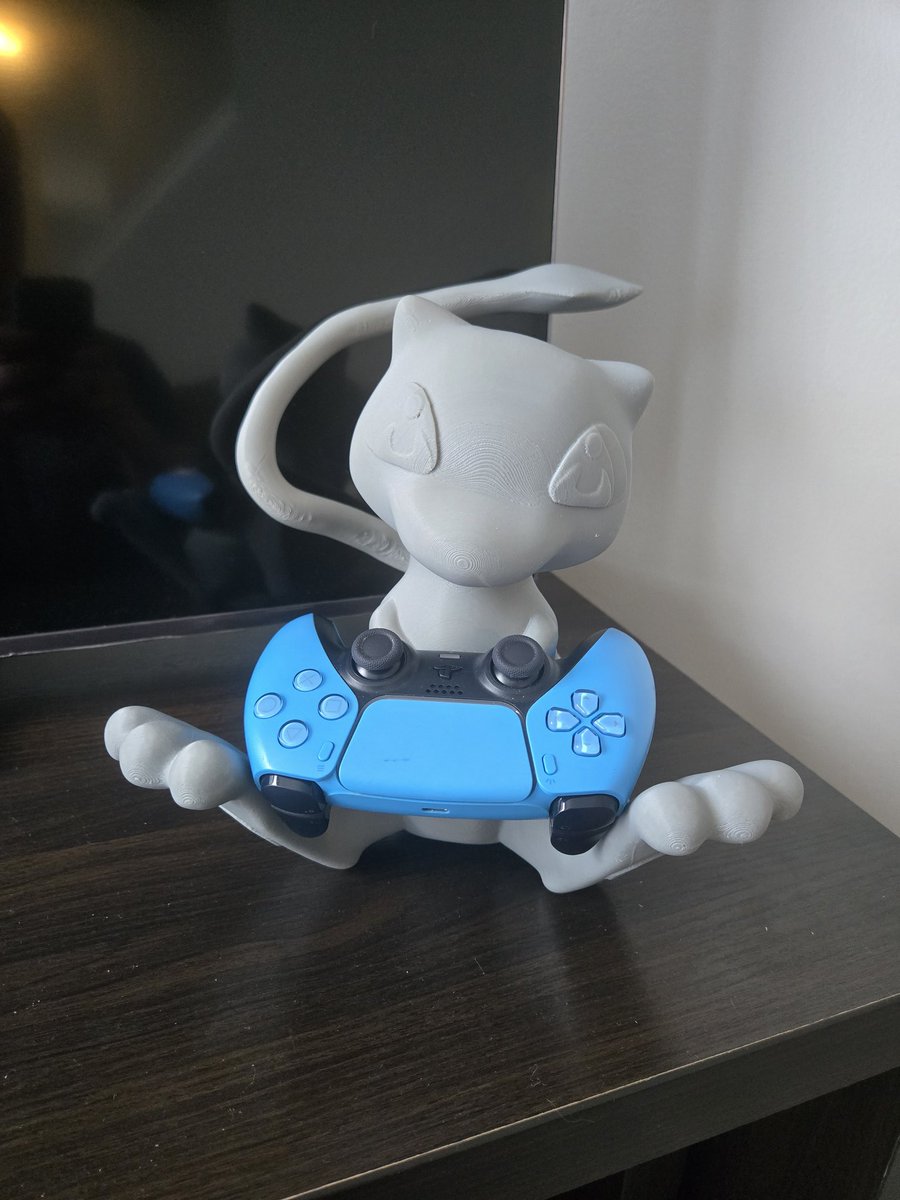 Check out this Mew Controller holder I printed