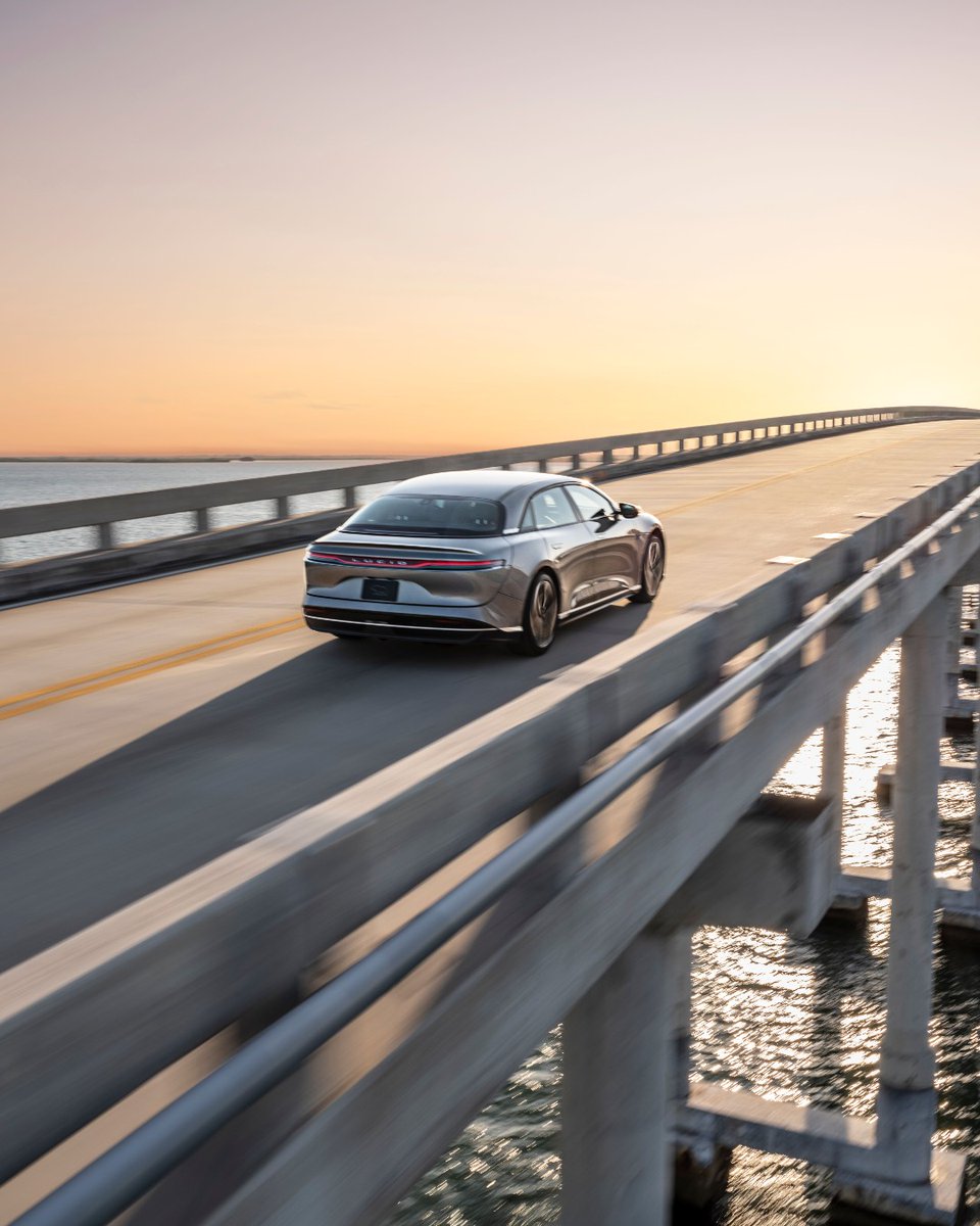 LucidMotors's tweet image. Reimagine that summer getaway in a Lucid Air.
With up to 512 miles of range on a single charge, the road is yours.