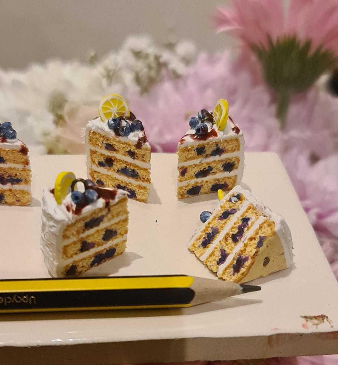 Made tiny blueberry cakes. Might turn them into necklaces or ear rings