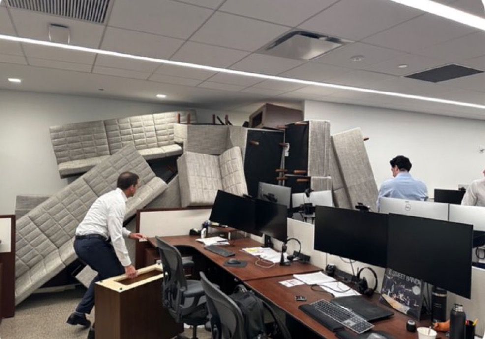 A chilling photo from inside 345 Park Avenue as they barricaded inside while the crazed shooter sprayed bullets around them.